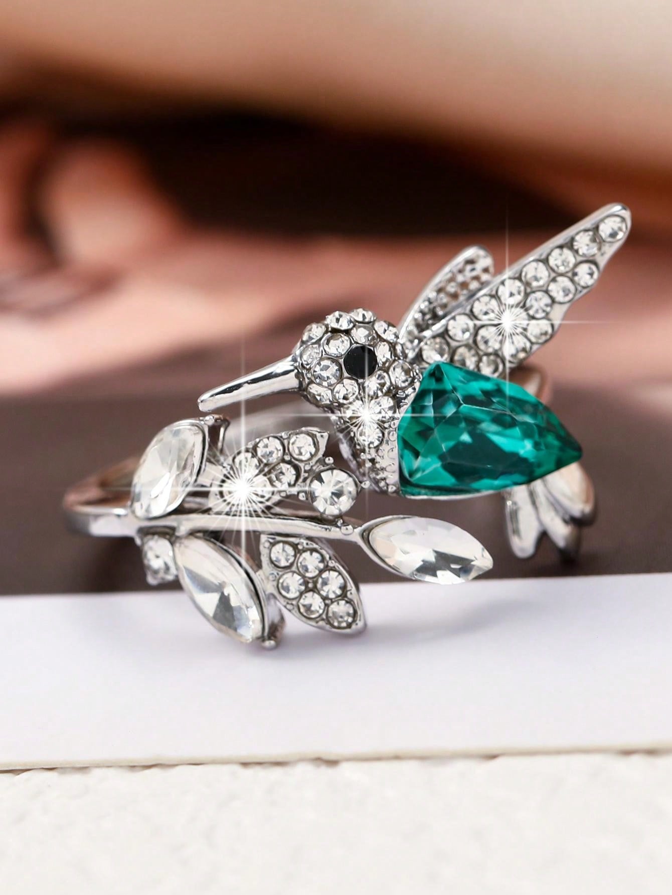 Elegant Blue Stone Hummingbird Ring β Adjustable Glass-Filled