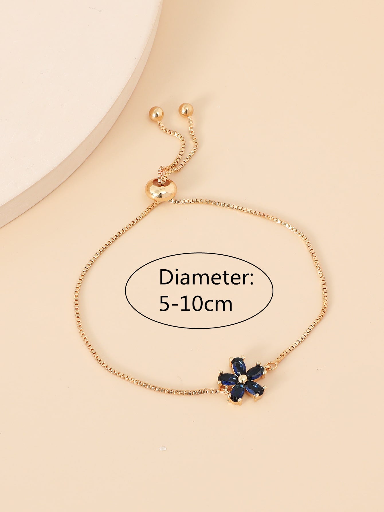 Flower-Shaped Copper Bracelet with Cubic Zirconia