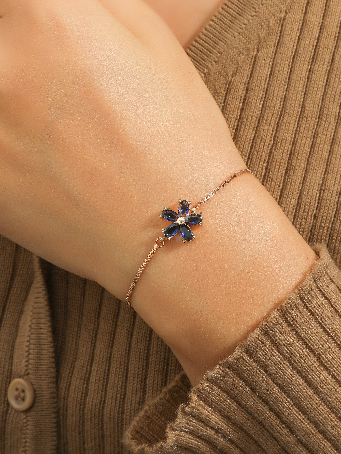 Flower-Shaped Copper Bracelet with Cubic Zirconia